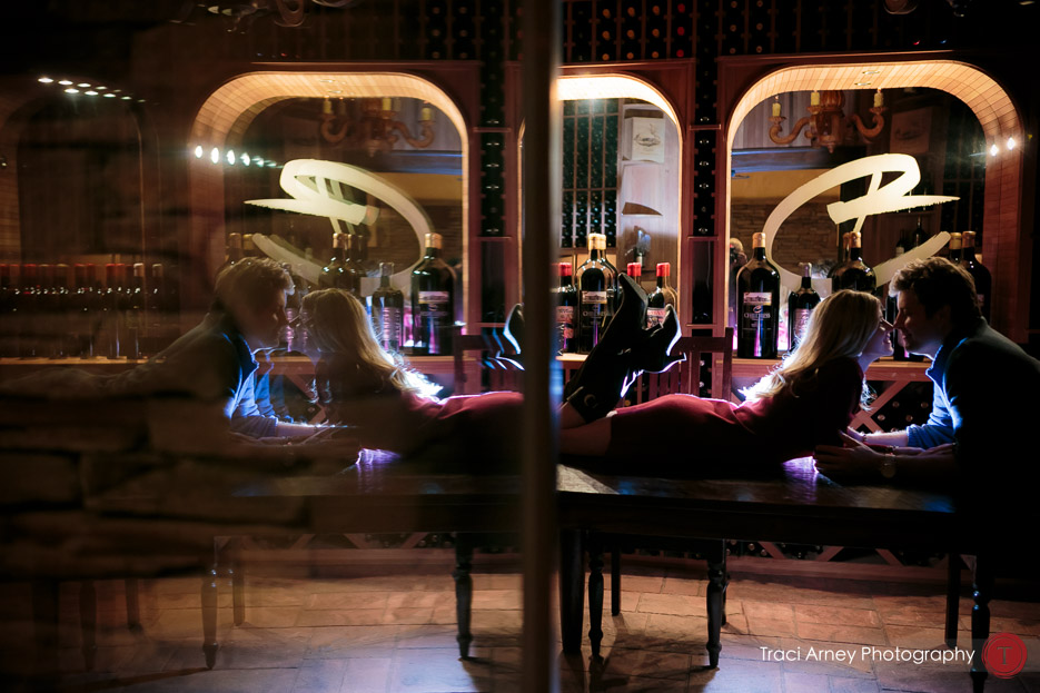 Couple kissing at Childress Vineyard with mirrored reflection